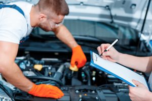 Car mechanics at the service station